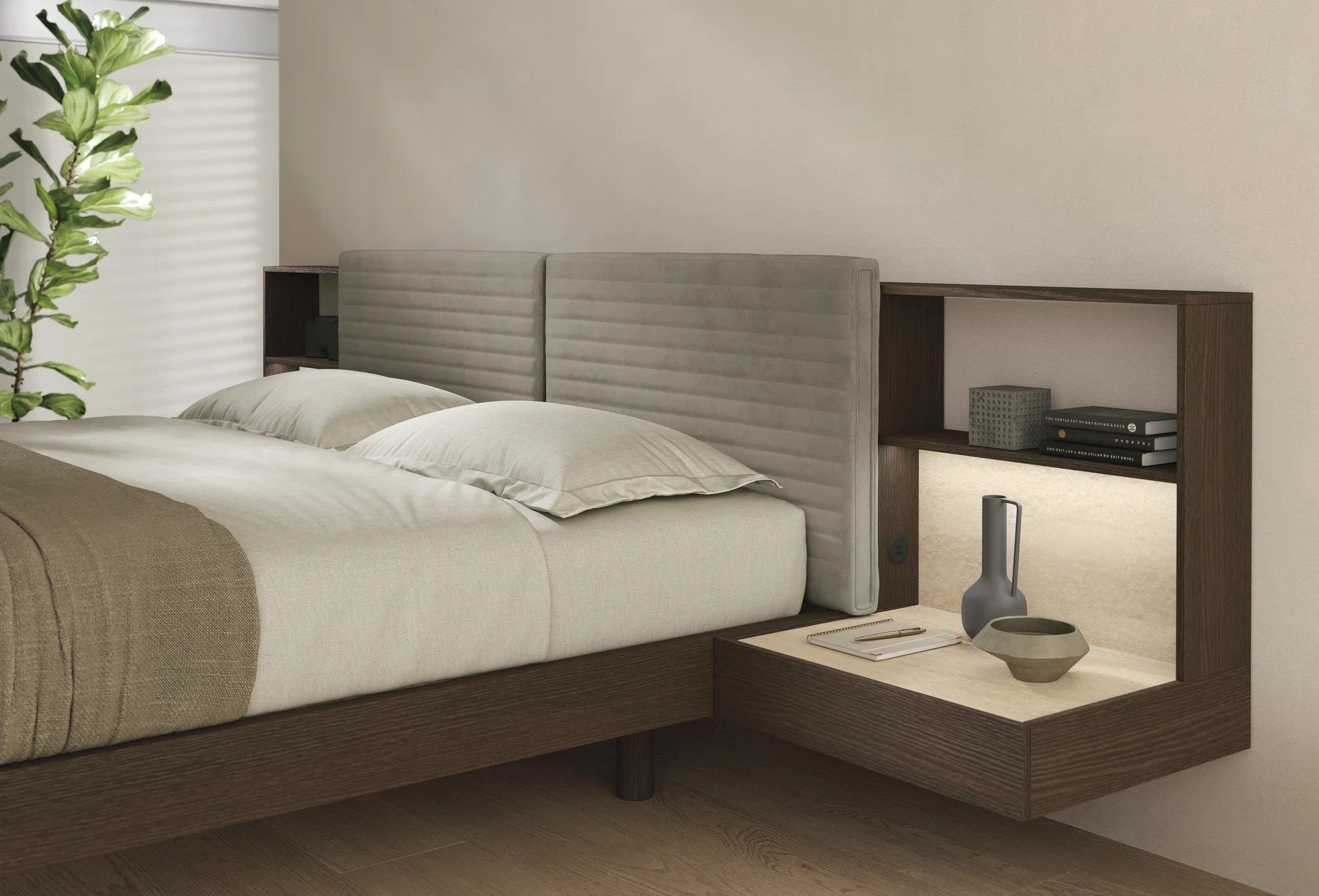 Dettaglio del sistema letto Yuki Tomasella in materico Rovere Moka: testiera a cuscini, comodini integrati con mensola illuminata a LED. Tomasella Night Collection 2024.