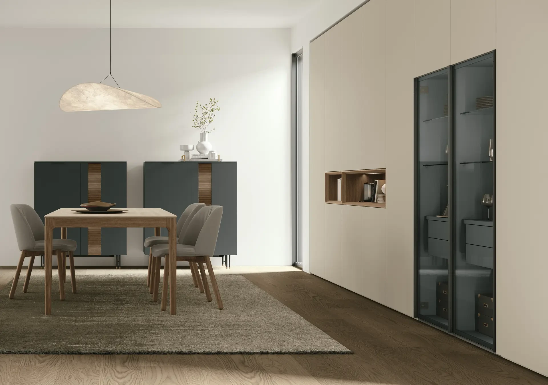 Tomasella Logica Plus+ 04.A: vista laterale della zona pranzo con le madie Bliss in laccato Marna 180 e Piquet, tavolo Savoy e sedie Sofia. Armadiatura materico Argilla Tortora. Catalogo Logica Plus+.