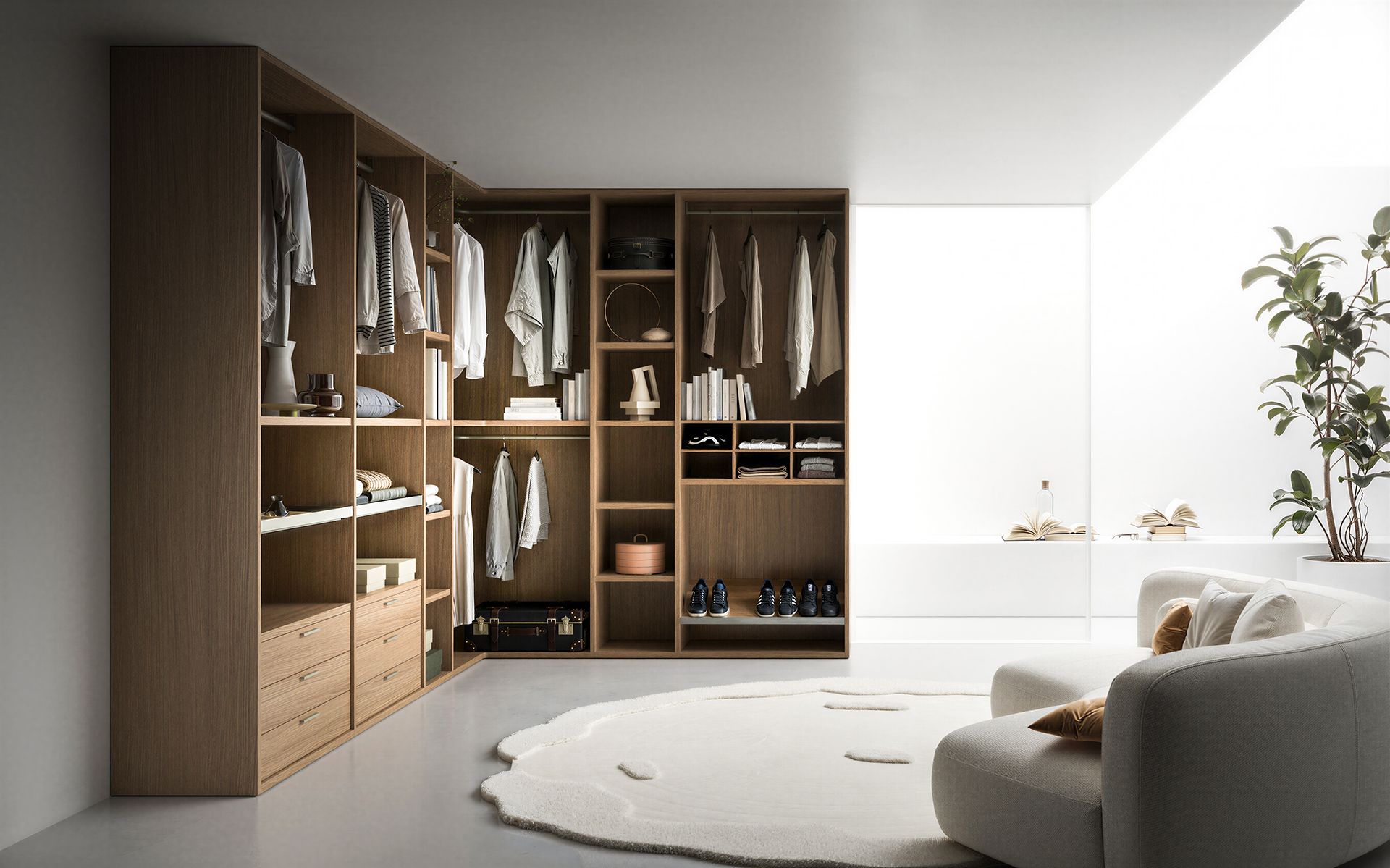 Cabina armadio Prime di Tomasella, composizione angolare PM_103 in finitura rovere, con moduli a giorno, cassetti, appendiabiti e vani libreria.